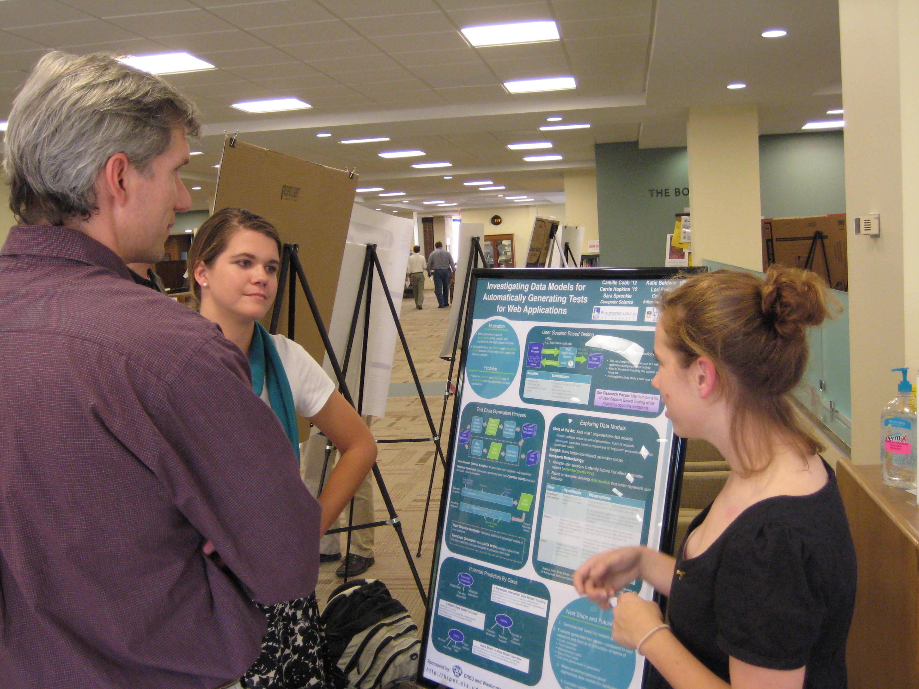Carrie (left) and Camille (right) present their work to German Professor Daniel Kramer
